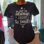 Marškinėliai: There's always a reason to smile
